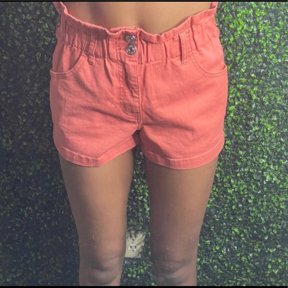 Peach shorts with ruffle detail